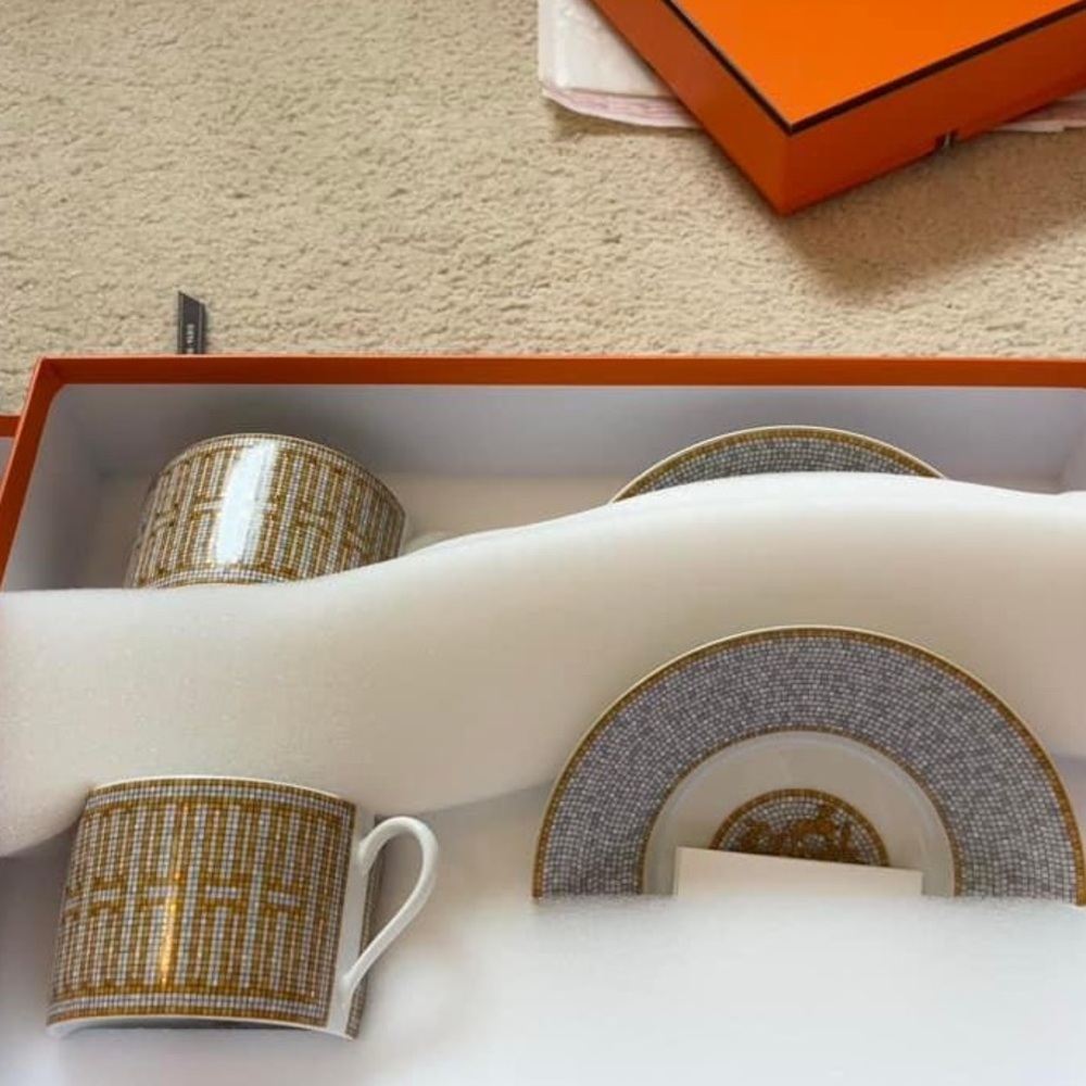 Hermes Mosaique au 24 gold tea cup and saucer